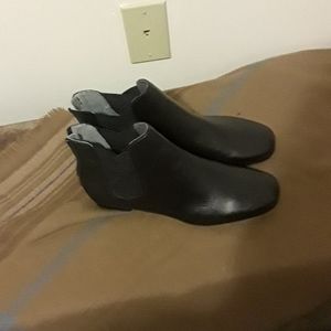 Black Chelsea booties.